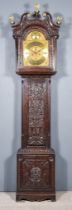 A 19th Century Oak Longcase Clock by George Hallifax of Doncaster, the 12ins arched brass dial