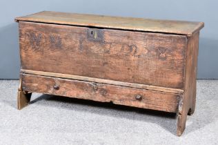 An Early 18th Century Oak Mule Chest, with single plank top, the front studded with "WM 1728",