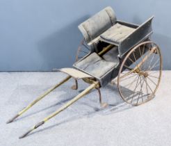 A Late Victorian Dog Cart, in painted wood, with iron wheels and rubber tyres, 62ins overall