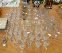 A QUANTITY OF CUT GLASS, WINE AND SHERRY GLASSES, ALSO CHAMPAGNE GLASSES, TUMBLERS, TWISTED STEM