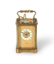 EARLY 1900'S BRASS CASED CARRIAGE CLOCK, the gilded dial with reserved Arabic chapter ring, with