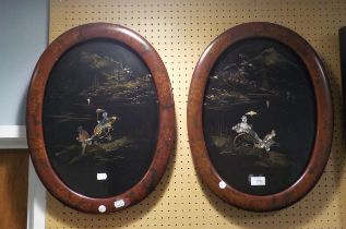 PAIR OF JAPANESE LACQUERED PANELS, INLAID WITH MOTHER O'PEARL, IN RED LACQUERED FRAMES (2)