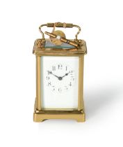 EARLY 1900'S FRENCH BRASS CASED CARRIAGE CLOCK, the dial with Arabic numerals, with key, 5 ¾" (14.