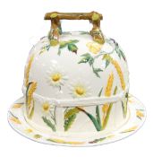 GEORGE JONES & SONS MAJOLICA CHEESE DOME, with naturalistic twig handles and decorated with
