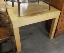 A JOHN LEWIS LIGHT OAK DINING TABLE, WITH SLIDING EXTENDING TOP, RAISED ON FOUR SQUARE LEGS, 90cm