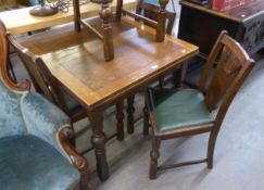 AN OAK DRAW-LEAF DINING TABLE, TOGETHER WITH FOUR OAK DINING CHAIRS WITH DROP-IN SEATS (5)