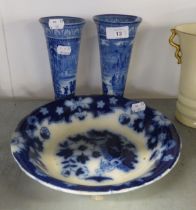 A PAIR OF MALING LATE 19TH CENTURY PRINTED BLUE AND WHITE TRUMPET VASES, WITH PRINTED