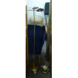 A PAIR OF GILT METAL MODERN FLOOR STANDING ADJUSTABLE STANDARD LAMPS (2)