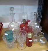 A SMALL GROUP OF CRANBERRY GLASS TO INCLUDE; A PARAFFIN LAMP, A SUGAR CASTOR AND OTHER ITEMS OF