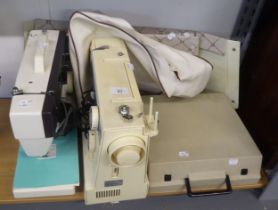 A NEW HOME 'SELECTOR' ELECTRIC SEWING MACHINE, A JONES BUTTONMATIC ELECTRIC SEWING MACHINE AND AN