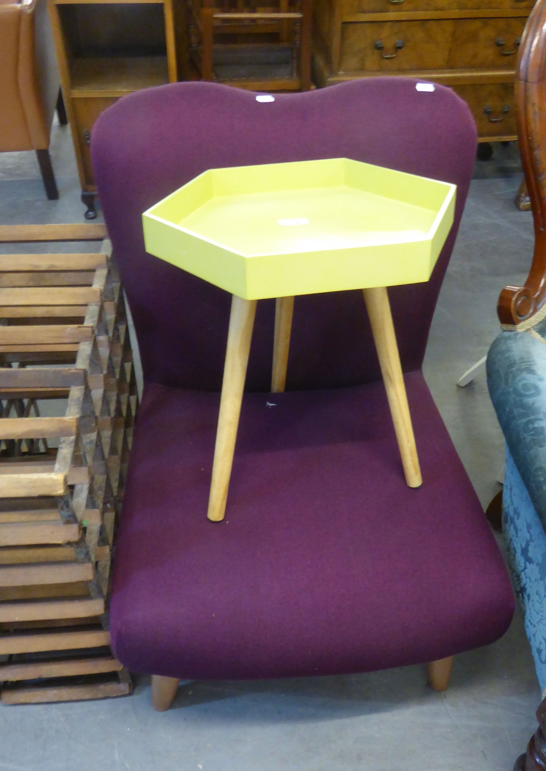 A PURPLE COLOURED FABRIC LOW SEATED BEDROOM CHAIR AND A HEXAGONAL TOP TRIPOD SIDE TABLE (2)