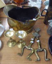 A BRASS HELMET SHAPED COAL RECEIVER WITH SWING HANDLE, A PAIR OF BRASS PRICKET CANDLESTICKS WITH