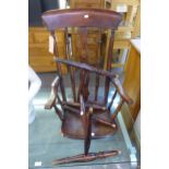 A VICTORIAN MAHOGANY FRAMED OPEN ARMCHAIR (LEGS DETACHED) (A.F.)