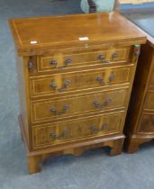 A MODERN WALNUT FLIP-TOP CHEST OF FOUR DRAWERS