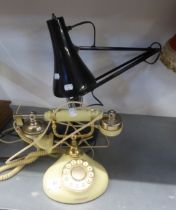 A BLACK ANGLEPOISE DESK LAMP AND A ROTARY DIAL CREAM PLASTIC COPY OF A VINTAGE TELEPHONE (2)