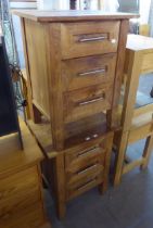 A PAIR OF HEAVY STAINED WOODEN THREE DRAWER BEDSIDE CHESTS (2)