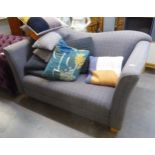 A TWO SEATER SOFA, COVERED IN GREY CHECK FABRIC