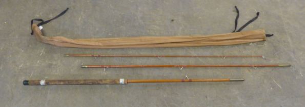 A SPLIT CANE FISHING ROD