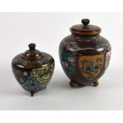 TWO JAPANESE MEIJI PERIOD CLOISONNE VASES AND COVERS, each of tapering form with peg feet, decorated