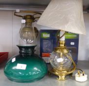 A BRASS OIL LAMP, CONVERTED TO AN ELECTRIC TABLE LAMP, ANOTHER TABLE LAMP AND A TEVION INTERNET