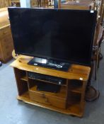 A SEIKI 40" FLATSCREEN TV, A PANASONIC DVD/VIDEO PLAYER, A FREE-VIEW BOX AND A PINE CORNER TV