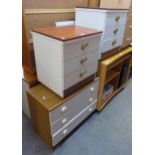 TWO WOOD-EFFECT AND WHITE MELAMINE BEDSIDE CHESTS OF THREE DRAWERS AND A SIMILAR LOW CHEST OF