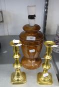 AN ELM LAMP BASE AND A PAIR OF BRASS CANDLESTICKS (3)