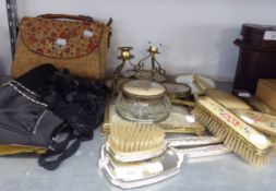 AN EIGHT PIECE GILT METAL AND FLORAL EMBROIDERED DRESSING TABLE SET WITH TRAY AND OTHER DRESSING