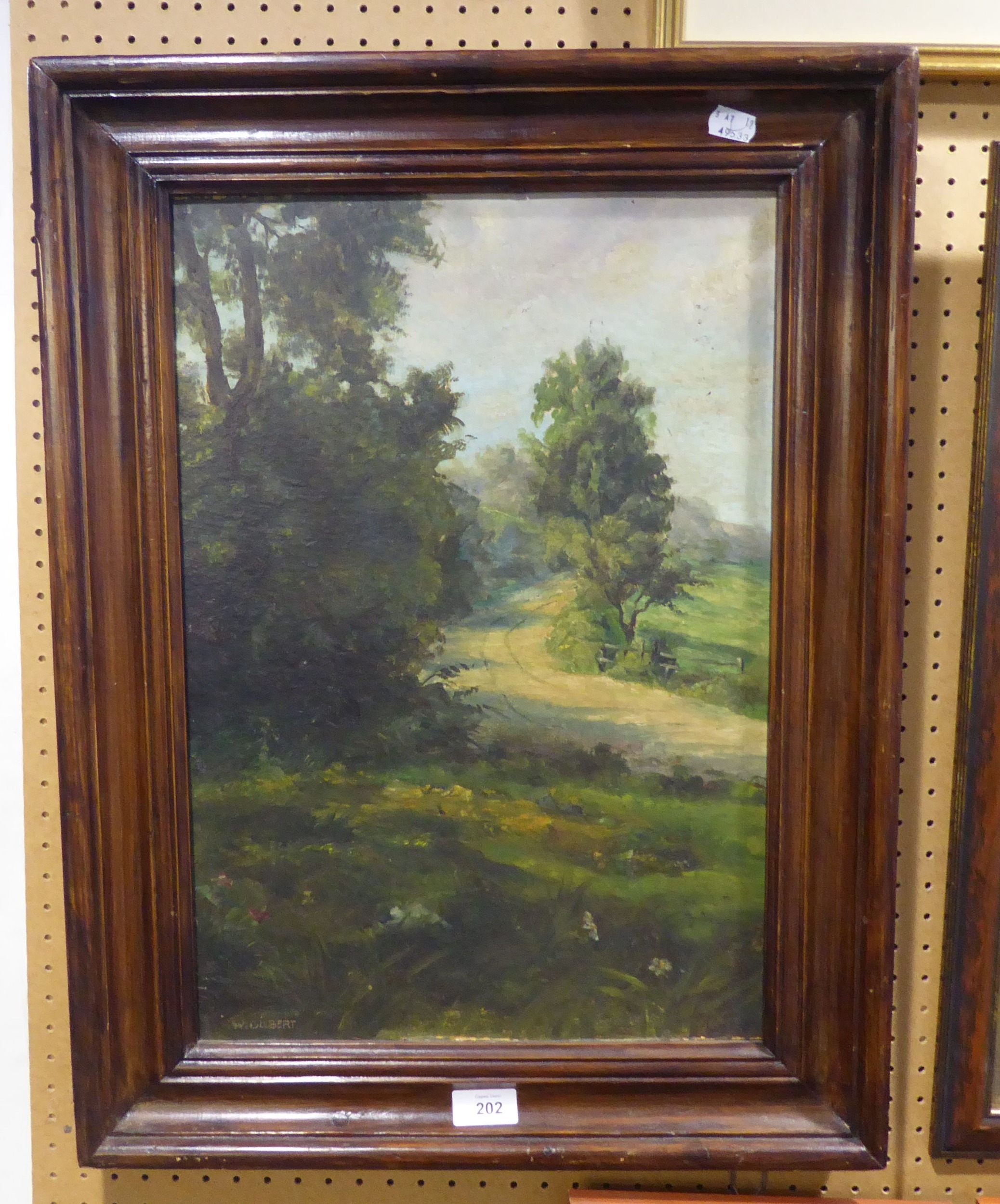 OIL PAINTING; W. GILBERT OIL ON BOARD PASTORAL SCENE WITH GREEN LANE SIGNED LOWER LEFT 19 1/2" X