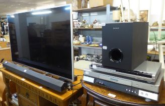 SONY 42" TELEVISION WITH SOUND BAR AND REMOTE CONTROL, TEVION DVD PLAYER AND A PANASONIC VIDEO
