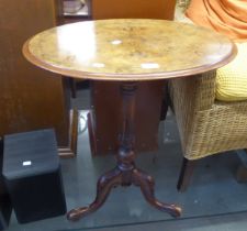 A VICTORIAN WALNUT OVAL TOPPED TRIPOD OCCASIONAL TABLE