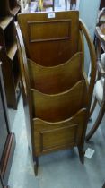 A MAHOGANY THREE TIER PERIODICAL RACK