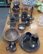 QUANTITY OF PEWTER TO INCLUDE; TANKARDS, CHARGERS, CANDLESTICKS, ETC... AND TWO LARGE COASTERS