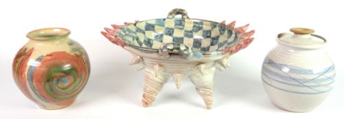 MODERN STUDIO POTTERY TWO HANDLED BOWL, on four cone shaped supports, decorated with a chequered