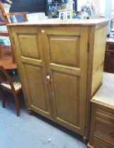 A PINE PANTRY CABINET, HAVING TWO PANEL DOORS