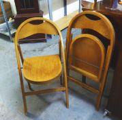 A PAIR OF 1930's PRESSED WOOD FOLDING CHAIRS (2)