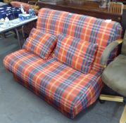 A BED SETTEE, COVERED IN COLOURED CHECK FABRIC