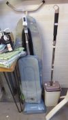 AN ORECK VACUUM CLEANER, A MIRCOTEX MOP AND BUCKET, A TUBULAR METAL IRONING BOARD AND AN ELECTRIC
