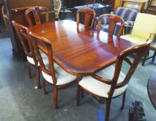 A GOOD QUALITY REPRODUCTION DINING ROOM SUITE COMPRISING; A DISPLAY CABINET, TWIN PEDESTAL DINING
