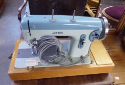 A PORTABLE ELECTRIC SEWING MACHINE