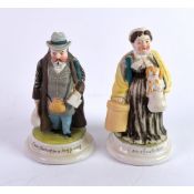 PAIR OF NINETEENTH CENTURY FIGURAL PORCELAIN TAPER HOLDER AND STRIKE, each painted in colours and