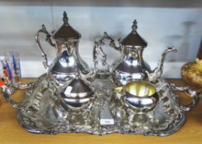 F B ROGERS, GEORGIAN STYLE FOUR PIECE ELECTROPLATED TEASET AND THE TWO HANDLED TRAY with floral
