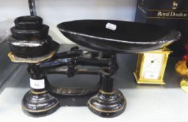 A BYGONE SET OF SHOP SCALES AND A NEST OF THREE WEIGHTS