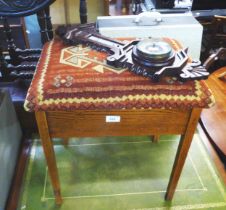 AN OAK FRAMED BAROMETER AND A SMALL OAK PIANO STOOL WITH FABRIC TOP (2)