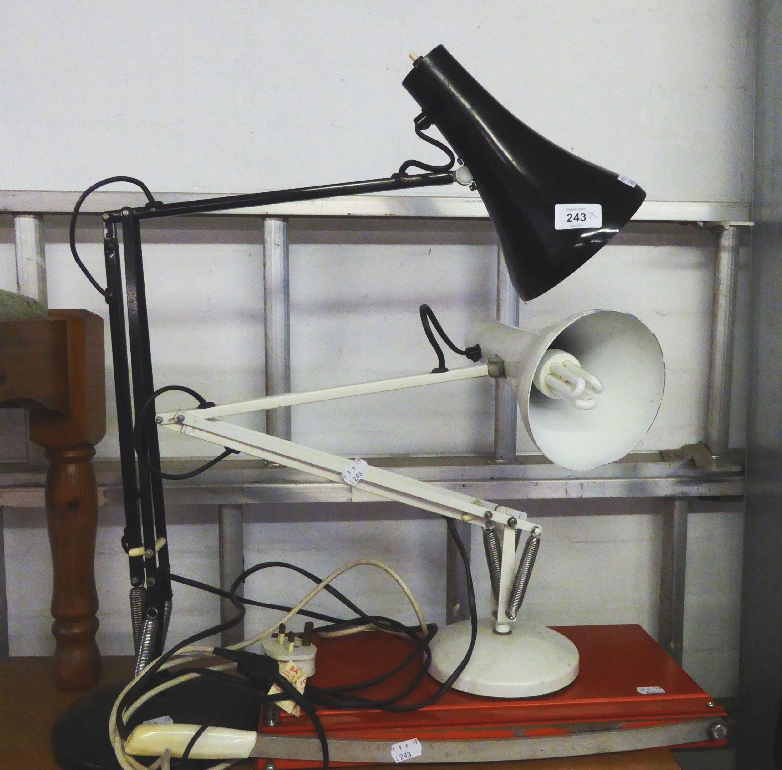 BLACK ANGLEPOISE LAMP, A WHITE ANGLEPOISE LAMP, A CHROME SHOE RACK AND A VINTAGE PAPER