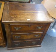 AN ANTIQUE OAK CHEST OF THREE GRADUATED DRAWERS WITH PANEL SIDES (A.F.)