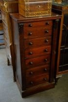 A LATE VICTORIAN MAHOGANY WELLINGTON CHEST OF SEVEN DRAWERS