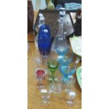 TWO CUT GLASS DECANTERS AND STOPPERS, THREE PALE BLUE GLASS WINE GOBLETS AND MISC VINTAGE WINE