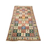 BAKHTIARI, WEST PERSIAN, SMALL CARPET WITH ALL-OVER TILE PATTERN in white and various colours,