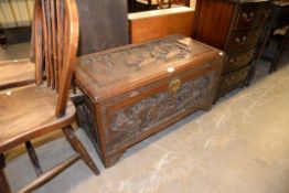 A CHINESE CARVED CAMPHOR-WOOD BLANKET CHEST (LACKS INTERIOR SHELF)